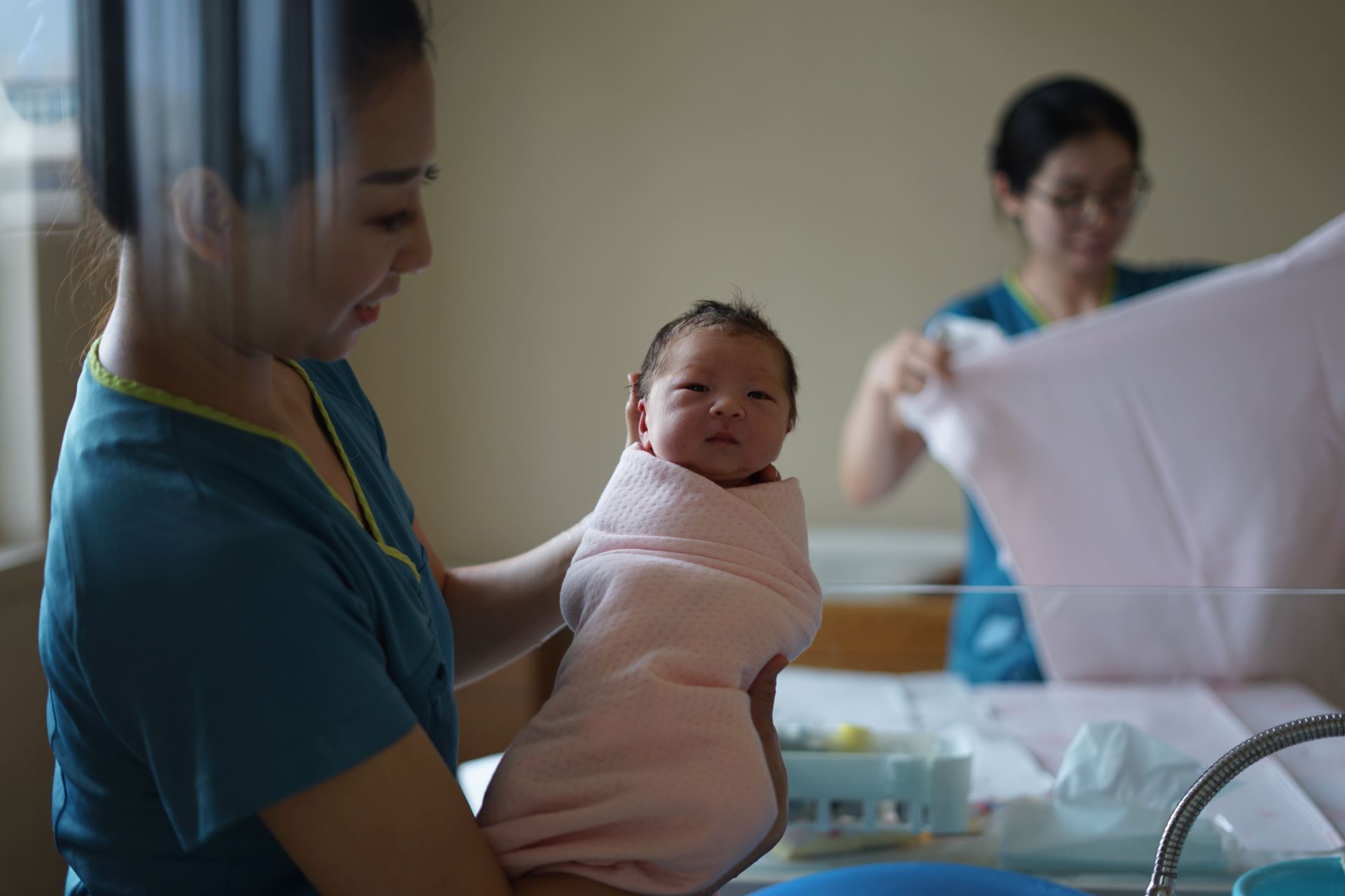 a person holding a baby